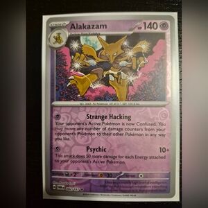 Pokemon Alakazam Card - Purple, Yellow, Pink